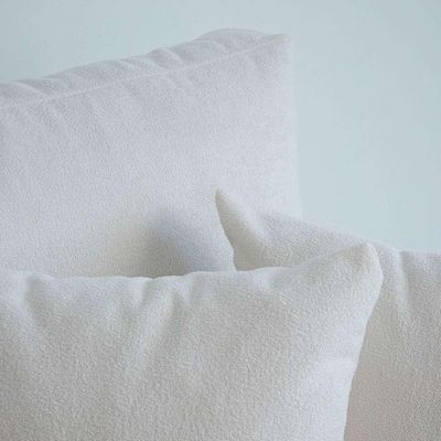 Sofá 2 Lugares com Molas Ensacadas 170 cm e Puff Unne Bouclé Off White
