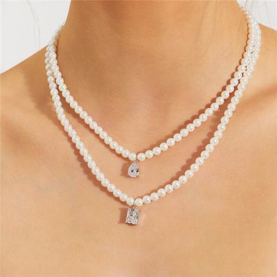 Colar Pérolas Shell Grace pingente retangular cristal ródio